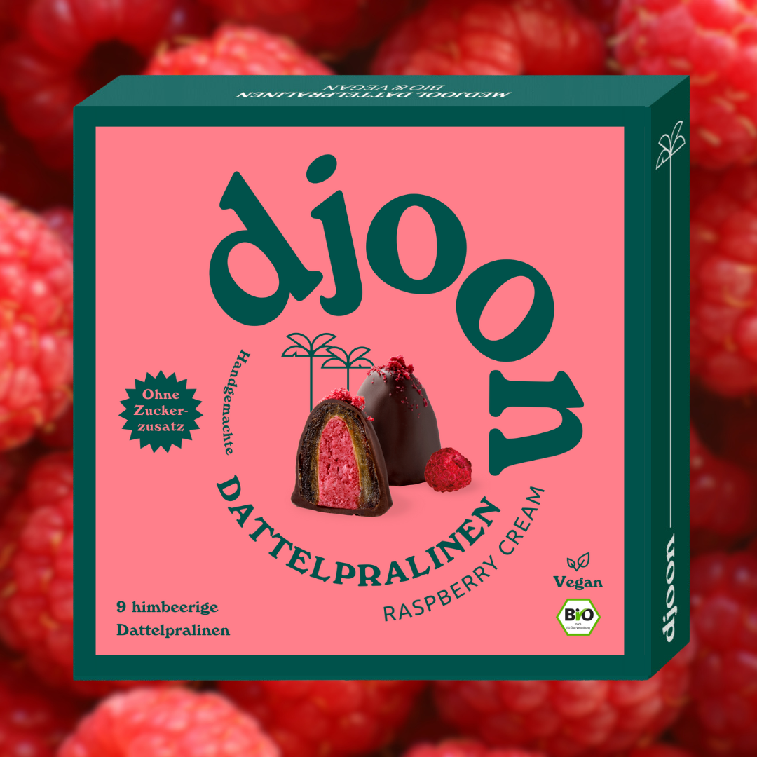 Eine kleine Geschenk Schachtel djoon Pralinen der Sorte Himbeer Creme